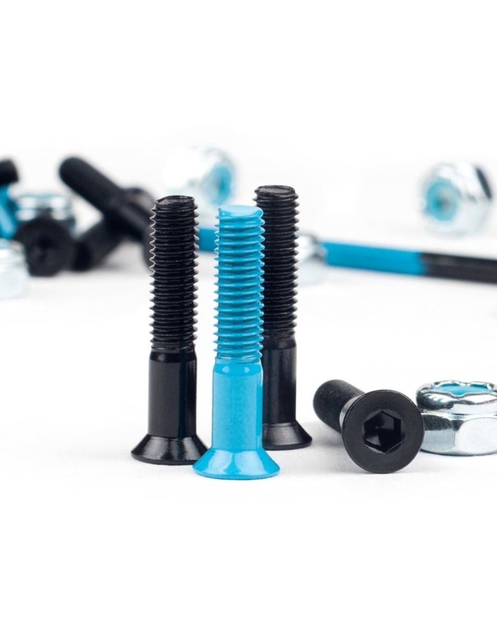 Modus Allen Bolts skateboard hardware set out of packet – durable Allen head bolts and lock nuts for skateboard decks and trucks, from Richmond Surf & Skate.