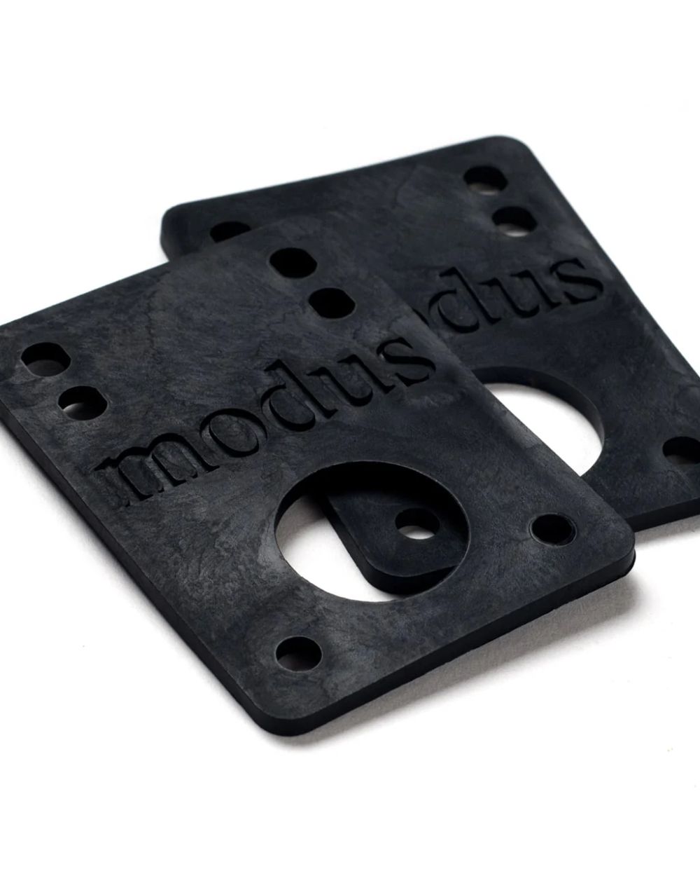 Modus Riser Pads in black – durable skateboard risers for trucks and decks, available at Richmond Surf & Skate.