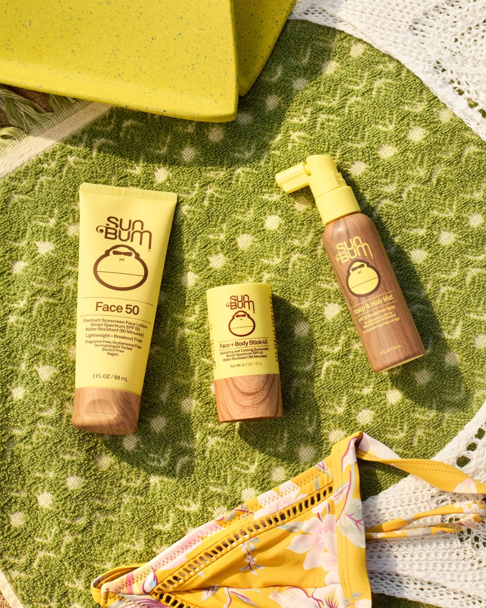 Sun Bum Scalp & Hair Mist SPF 30+ 59mL in a beach or outdoor lifestyle setting