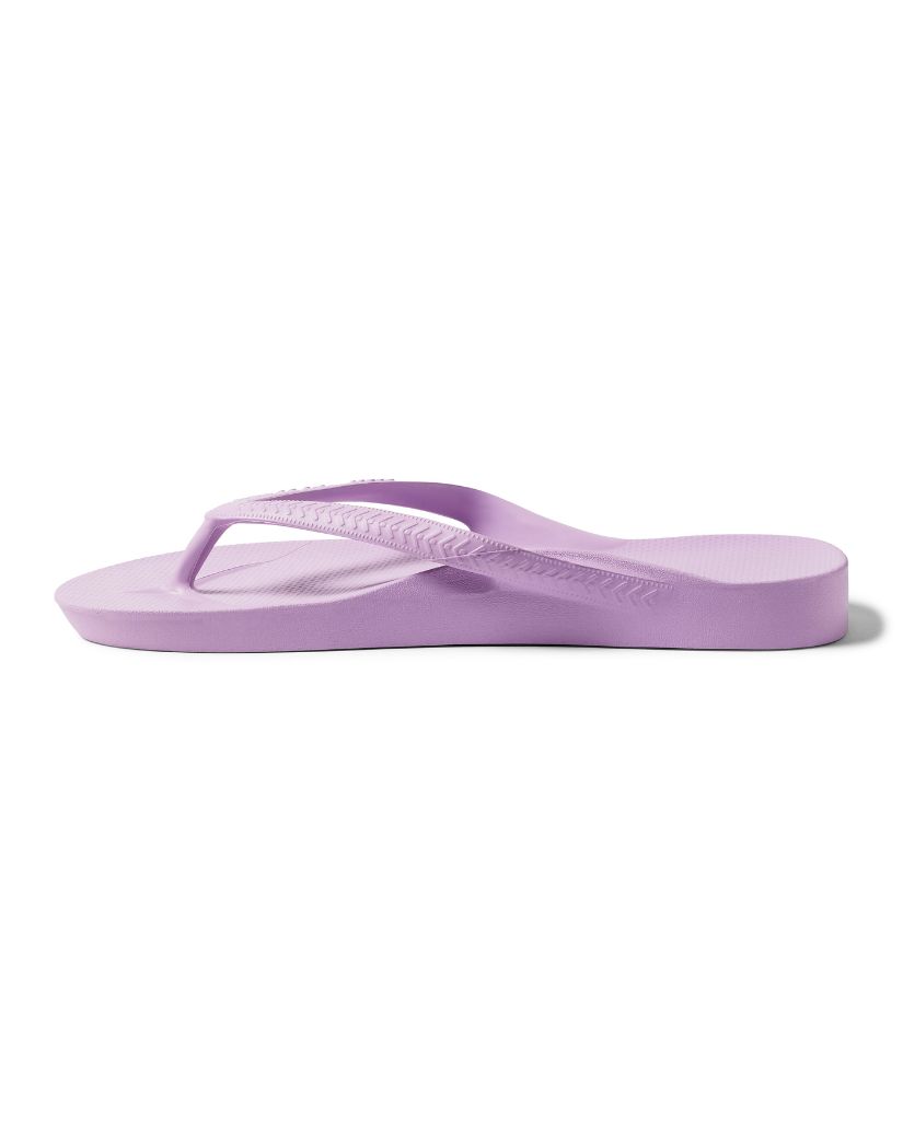 Side view of Archies Arch Support Thongs Lilac showing built-in arch support