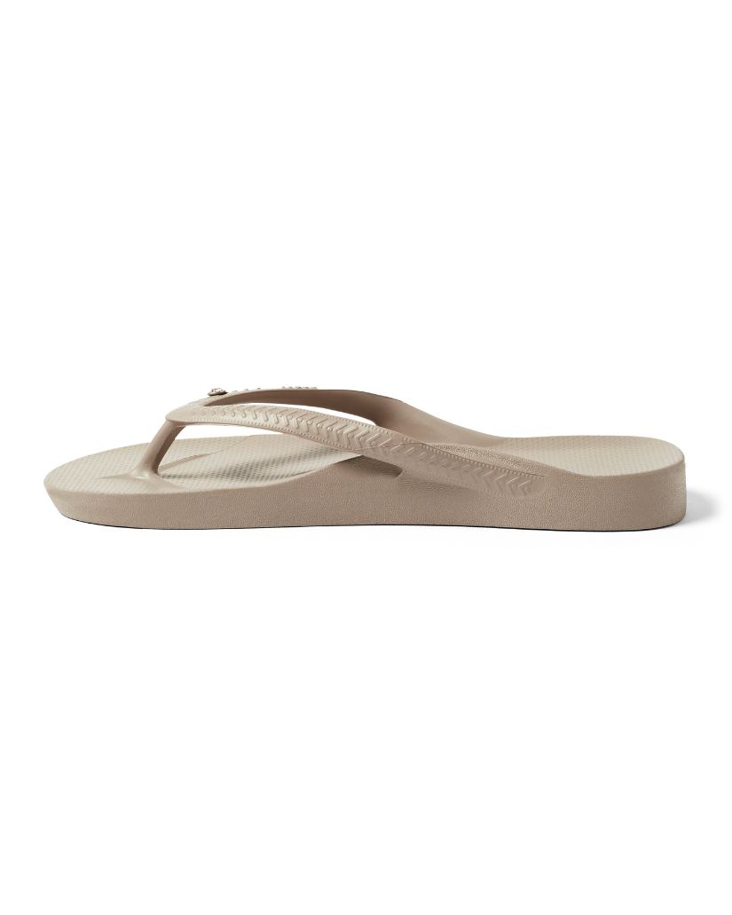 Side view of Archies Crystal Taupe thongs showing arch support